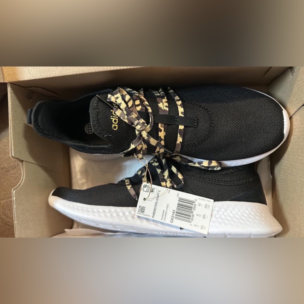 Adidas cheetah print and black tennis shoes